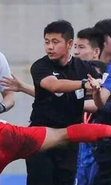 Players attacked as ugly mass brawl breaks out in Chinese Cup match